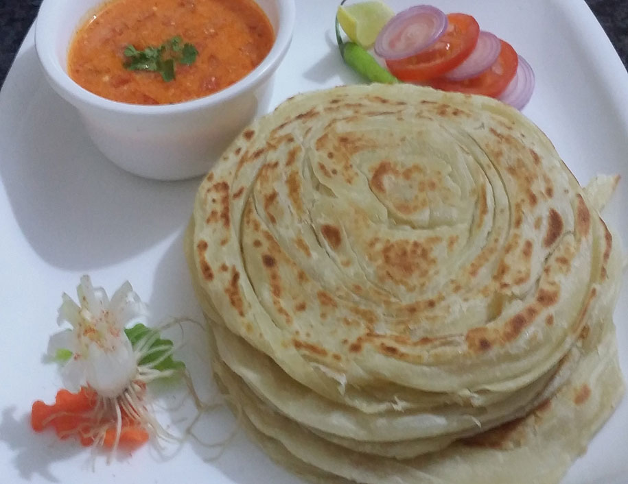Parotta served fresh at Velan Bhavan
